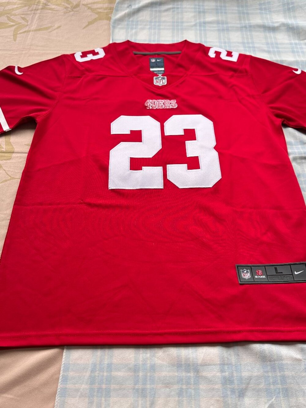 The Home Jersey Of Christian Mccaffrey, Number 23, Of The San Francisco 49ers In
